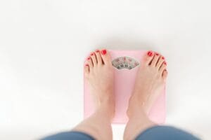 standing on a scale pexels-shvets-production-6975474